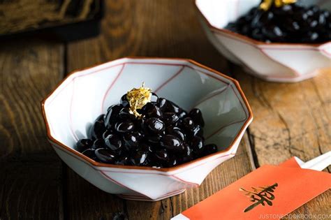 The shiny black beans called Kuromame (Sweet Black Soybeans) are served on New Years Day as a ...