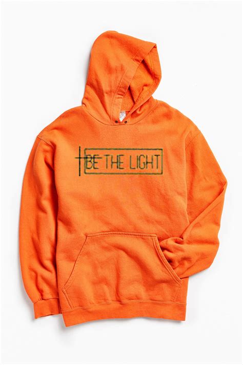 Be The Light orange hoodie