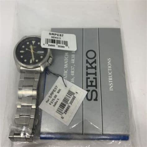 Seiko SRPE57 black and gold gilt diver men’s automatic watch - FREE SHIPPING | WatchCharts