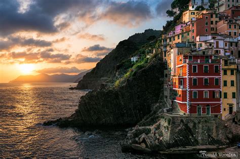 Sunset in Riomaggiore | Riomaggiore, Wonders of the world, Travel pictures