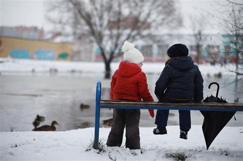 Premium Photo | Children in winter park play