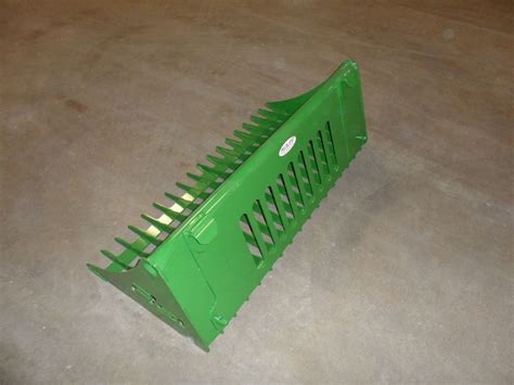 John Deere Sub-Compact Tractor 1 and 2 Series Rock Bucket 54" - Redline Systems Inc. Equipment ...