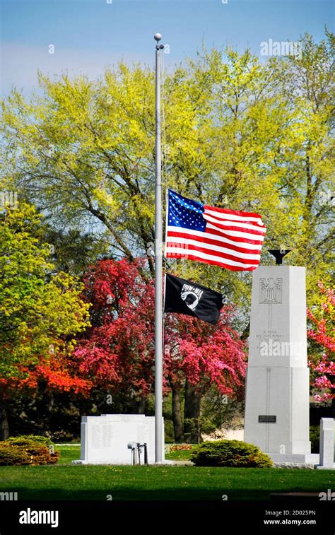 United States flag flying at half mast staff Stock Photo - Alamy