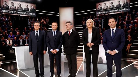 Macron seen winning French TV debate, clashes with Le Pen