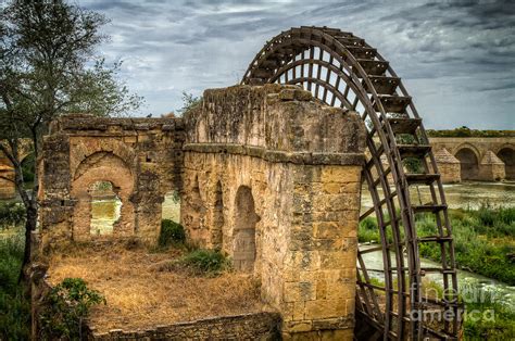 Water Wheel by the Roman Bridge Photograph by Michael Trahan