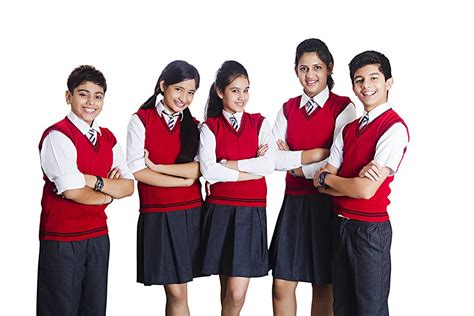 Group-Of School Students Friends in-Winter Uniform With Arms-Crossed Standing Together