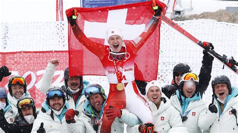 Marco Odermatt emerges from snowy giant slalom with breakthrough gold ...