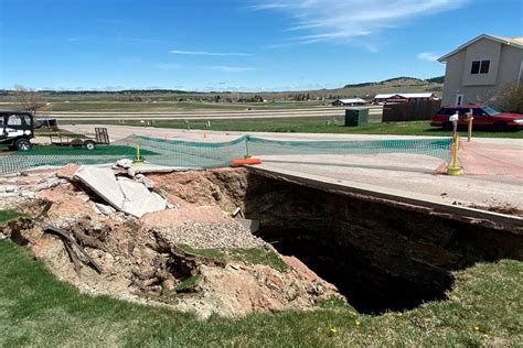 Sciency Thoughts: Families evacuated after sinkhole opens near homes in ...