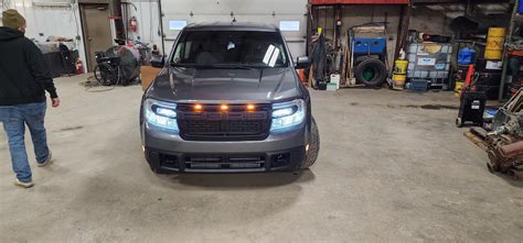 Raptor style grille and lights installed on 2023 Atlas Blue Maverick ...