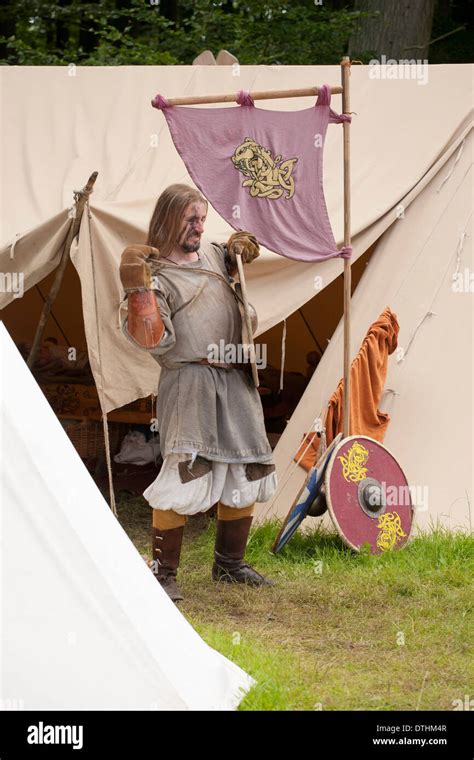 Viking warrior preparing for battle at a viking reenactment festival in Denmark Stock Photo - Alamy