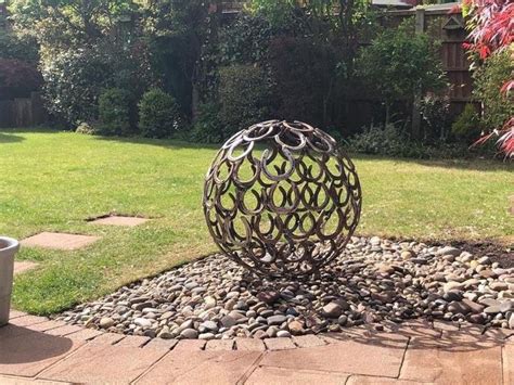 Garden Spheres Garden Sculpture Orb Horseshoe Sphere | Etsy | Garden spheres, Garden sculpture ...