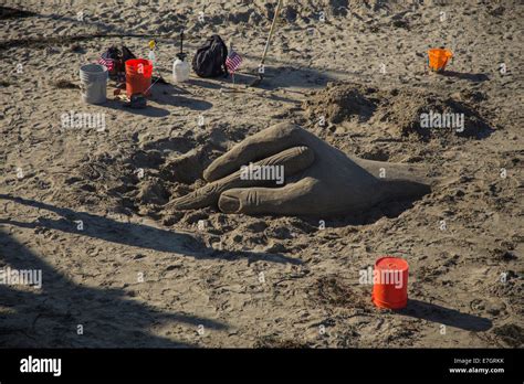 The Artist Hand is sand art on the beach in Santa Cruz California Stock ...