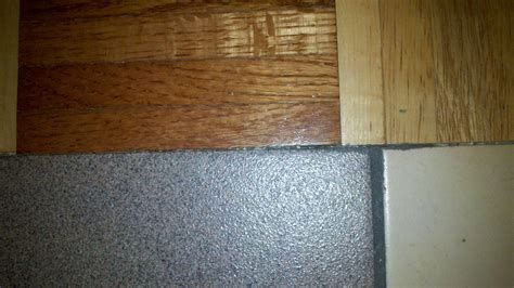 How can I create an "invisible" transition between different flooring types? - Home Improvement ...