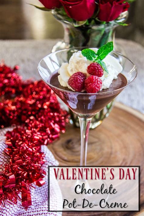 valentine's day chocolate pot de creme with raspberries and whipped cream