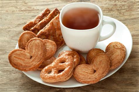 Assorted Snacks Bakery with a Cup of Tea Stock Photo - Image of kitchen, brown: 94963908