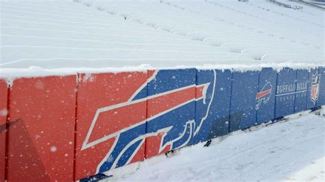 Buffalo Bills fans shovel Highmark Stadium shirtless, slide down snow ...