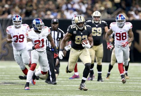 Benjamin Watson #82 of the New Orleans Saints runs for a first down ...