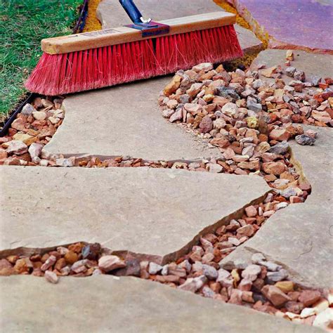 How to Install a Stone Walkway with Flagstone, Gravel, or Pavers