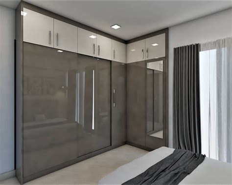 Modern L-Shaped Glossy Grey Wardrobe Design With Sliding Doors | Livspace