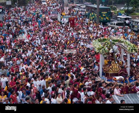 large crowd following the procession of the Black Nazarene Manila ...