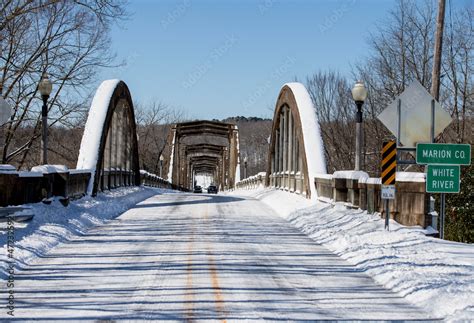 Rainbow Bridge at Cotter in winter snow Stock Photo | Adobe Stock