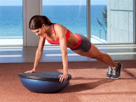 The bosu is so versatile! Use it for push ups, burpees or planks with the ball side down. Flip ...