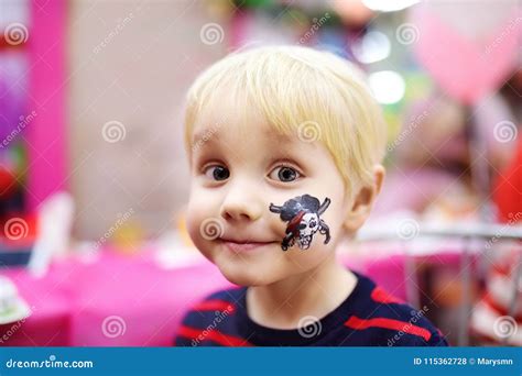 Face Painting for Cute Little Boy during Kids Birthday Party Stock ...