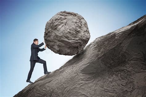 Sisyphus Metaphore. Young Businessman Pushing Heavy Stone Boulder Up on Hill Stock Photo - Image ...