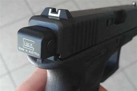 Man buys illegal gun accessory online that converts Glock pistol into ...