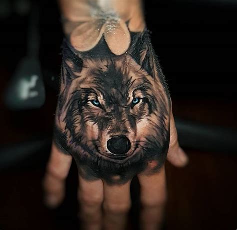 Wolf Hand Tattoo | Hand tattoos for guys, Hand tattoos, Wolf tattoo sleeve