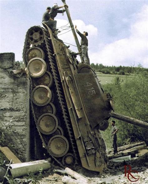 A Panther Ausf. G “415”, 1st Panzer Division, failed an attempt to cross a log bridge, Poland ...