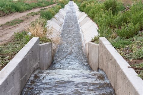 Premium Photo | Irrigation Ditch With A Flow Measurement Structure