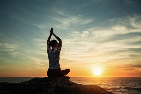 Female Yoga Silhouette on the Ocean Beach at Sunset Stock Image - Image of fitness, exercise ...