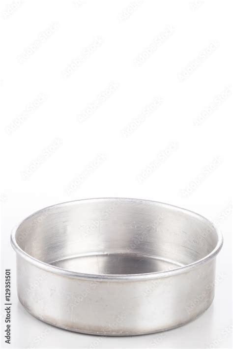 Metal pan for baking and cooking on white background. Stock Photo | Adobe Stock