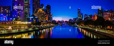 Panoramic night view over Yarra River and City Skyscrapers in Melbourne ...