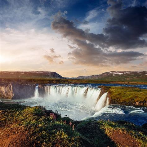 Godafoss Waterfall At Sunset. Fantastic Landscape. Beautiful Cumulus ...