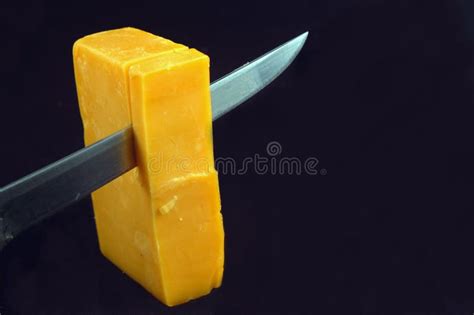 Cutting the Cheese stock photo. Image of black, isolated - 398278