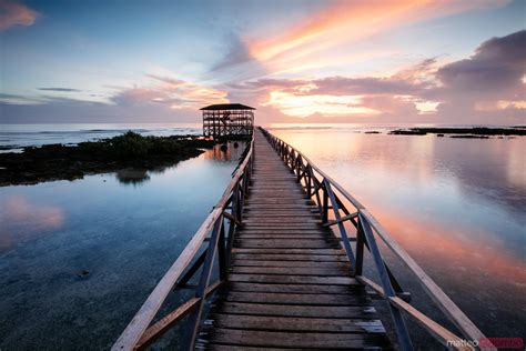 - Famous Cloud 9 surfing pier at sunset, Siargao, Philippines | Royalty Free Image