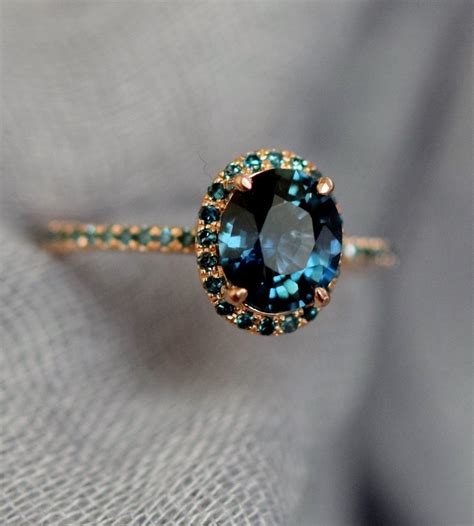 Blue Green sapphire engagement ring. Peacock sapphire oval halo bl ...