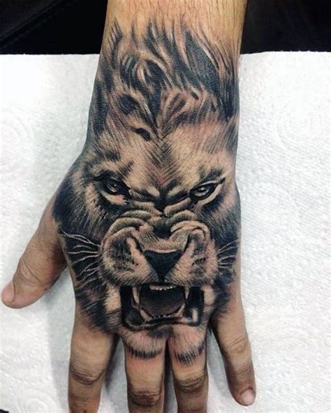 40 Lion Hand Tattoo Designs for Men | Löwe tattoo-design, Löwe hand tattoo, Hand tattoo