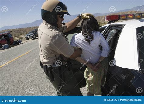 Cop Arresting Female Drunken Driver Stock Photo - Image of officer ...