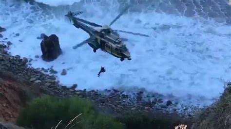 Woman rescued after falling off 200-foot cliff in Southern California ...