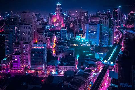 Aerial Explorations of International Cityscapes Washed in a Neon Glow by Xavier Portela | Colossal