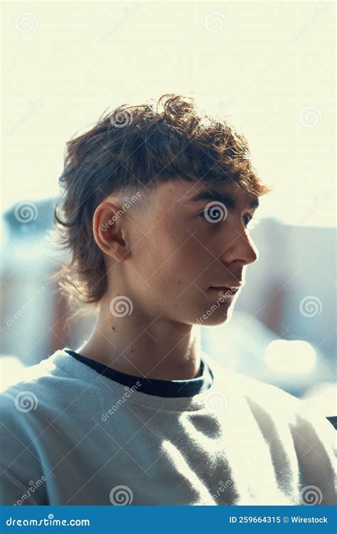 Vertical Portrait of a Young Caucasian Boy with a Fresh Mullet Haircut ...