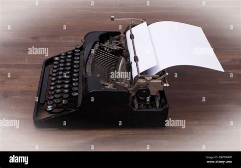 Vintage typewriter and old books Stock Photo - Alamy