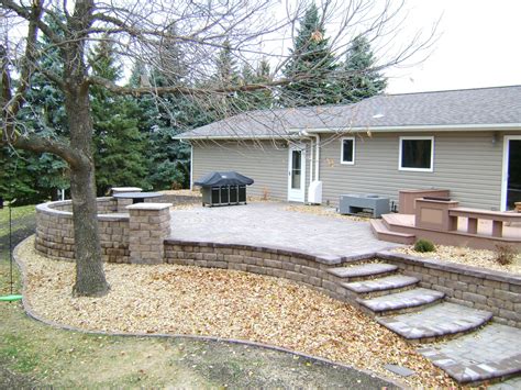 Raised Paver Patio with Retaining Walls, Stairs, Deck, and Seating Wall ...