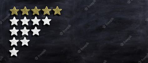 Premium Photo | Five golden stars isolated on black background 3d illustration