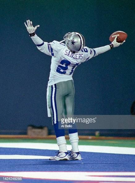 Deion Sanders, Wide Receiver for the Dallas Cowboys celebrates a ...