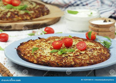 Rosti - Swiss Dish Made of Grated Potato Stock Photo - Image of diet ...