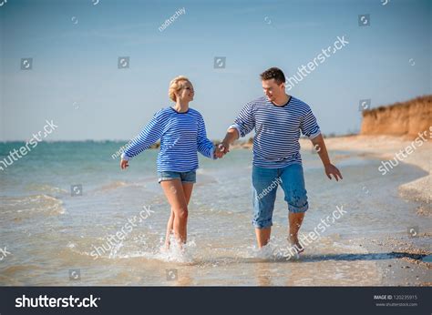 Two People Walking On Beach Stock Photo 120235915 | Shutterstock